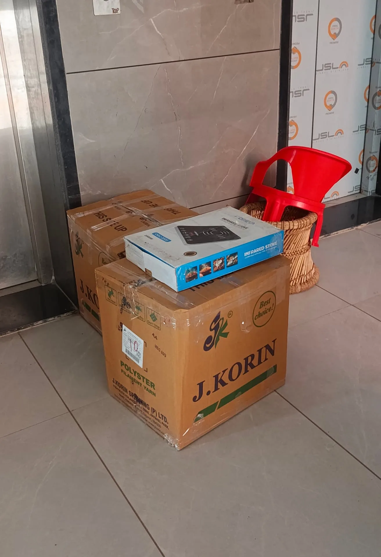 Packers and movers Surat team staging packed cartons for a home relocation