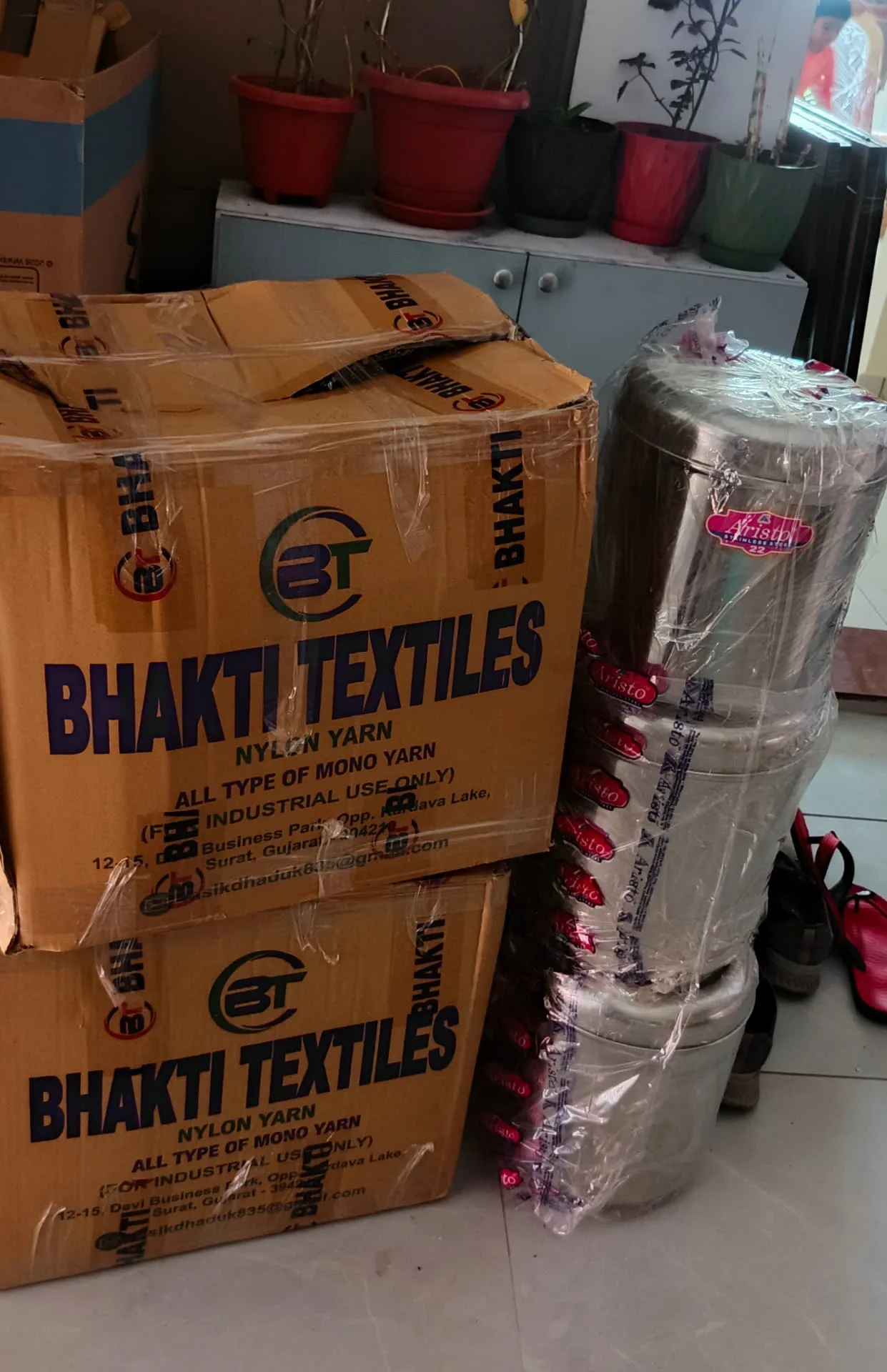 Courier and cargo services Surat — cartons packed and film-wrapped for dispatch
