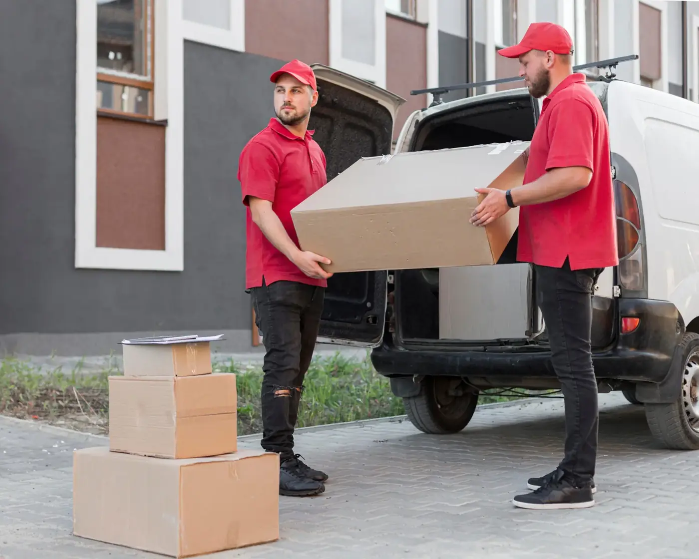 Rapid Packers and Movers Surat crew loading a packed carton into the moving van